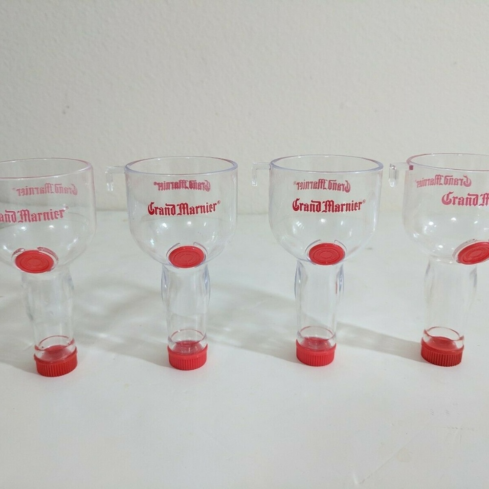 Lot (4) Grand Marnier mini bottle shot glasses